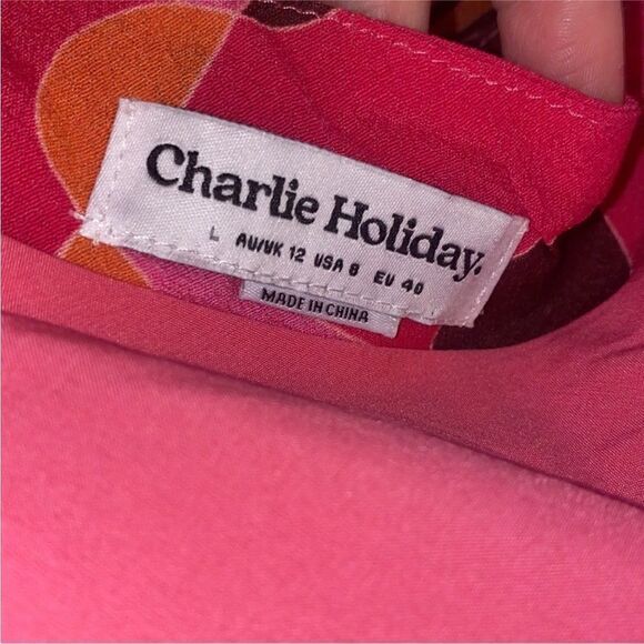 CHARLIE HOLIDAY NWT CATALINA 2 piece TOP AND SKIRT ABSTRACT SWIRL
PINK SIZE 8 - Picture 13 of 14